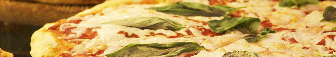 Eating Italian Pizza Sandwich at Pizza Boli's restaurant in Clinton, MD.